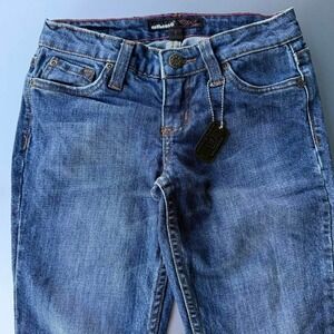 Dollhouse Delux blue low-rise jeans with pink stitching